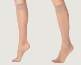 Ženske noge sa elastičnim čarapama za prevenciju venske insuficijencije 